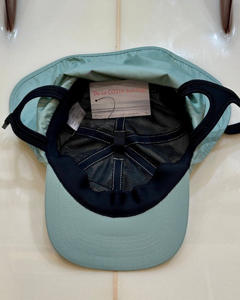 De La COSTA DLC shade surf cap